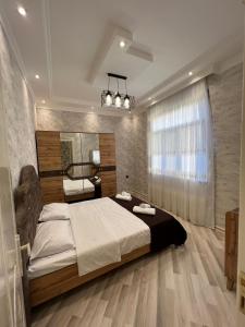 Ένα ή περισσότερα κρεβάτια σε δωμάτιο στο Nohur Lakeside Villa