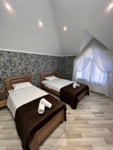 Lova arba lovos apgyvendinimo įstaigoje Nohur Lakeside Villa