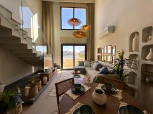 Posezení v ubytování Charming 3BR Villa/Free Pool & Lagoon Access@Gouna