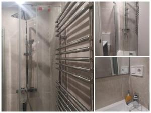 eine Duschkabine im Bad mit Spiegel in der Unterkunft Cathedral and Castle in Burgos