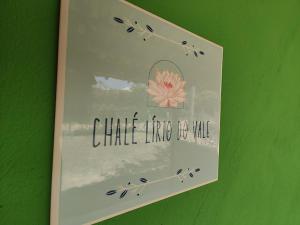 韦尔卡鲍Flor e Luz Chalés的绿色墙上的标志画 更多37张照片