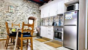 Köök või kööginurk majutusasutuses Ca lAixut Turismo Rural