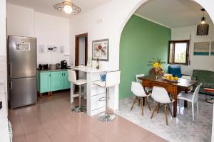 A kitchen or kitchenette at Casa Vacanze D'Urso