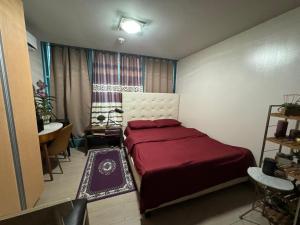 Кровать или кровати в номере KCAB Urban Vibe-One UpTown BGC
