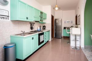 A kitchen or kitchenette at Casa Vacanze D'Urso