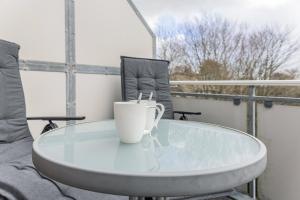 Ein Balkon oder eine Terrasse in der Unterkunft 50187...
