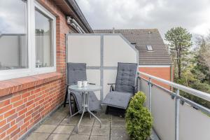 Ein Balkon oder eine Terrasse in der Unterkunft 50187...