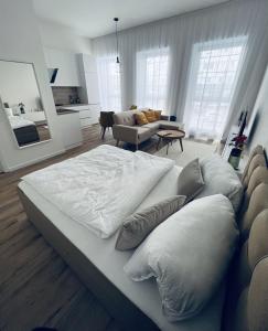 Postel nebo postele na pokoji v ubytování Park Tower apartment v centru Zlína