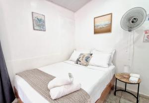 Ein Bett oder Betten in einem Zimmer der Unterkunft Oceanic Playa Matapalo