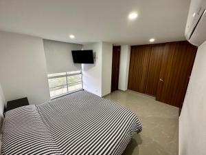 Gallery image of Excepcional apartamento a pasos del mar con piscina in Ríohacha +6 photos