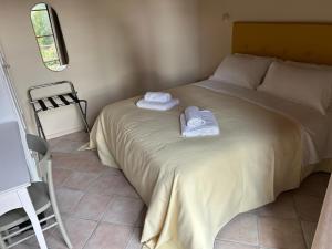 Agriturismo Tenuta i 4 venti客房内的一张或多张床位