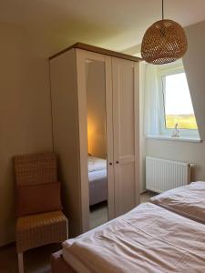 Postel nebo postele na pokoji v ubytování Haus-Seeschwalbe-Wohnung-4