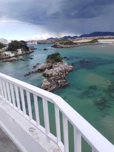 a view of the ocean from a bridge at Hotel Benimar in Isla