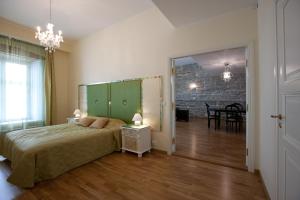 Ein Bett oder Betten in einem Zimmer der Unterkunft Cozy Apartment In Old Town