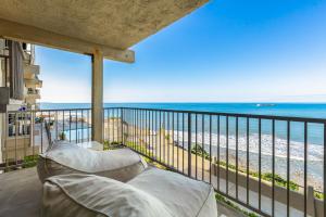 a balcony with a view of the beach at Del Mar Gem condo in Solana Beach