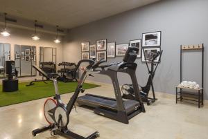 a gym with several exercise bikes in a room at Hotel Antik San Sebastián in Donostia-San Sebastián