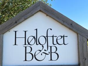 Certifikát, hodnocení, plakát nebo jiný dokument vystavený v ubytování Høloftet bb
