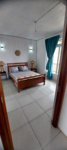 Postel nebo postele na pokoji v ubytování Residence le bijou mourouk rodrigues