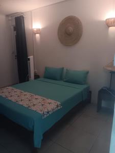 Postel nebo postele na pokoji v ubytování Residence le bijou mourouk rodrigues