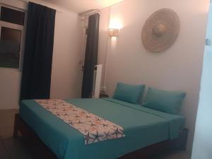 Postel nebo postele na pokoji v ubytování Residence le bijou mourouk rodrigues