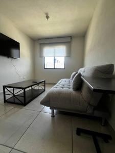 Χώρος καθιστικού στο Acogedora y moderna casa en Hidalgo