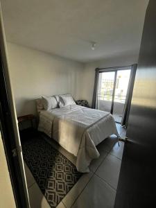 Ένα ή περισσότερα κρεβάτια σε δωμάτιο στο Acogedora y moderna casa en Hidalgo