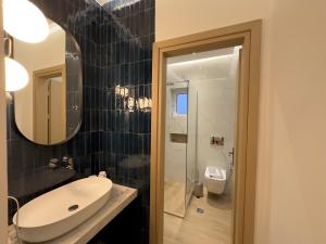 Kúpeľňa v ubytovaní Rooms Batalogianni
