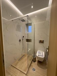 Kúpeľňa v ubytovaní Rooms Batalogianni