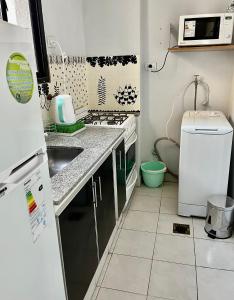 A kitchen or kitchenette at Departamento Jose