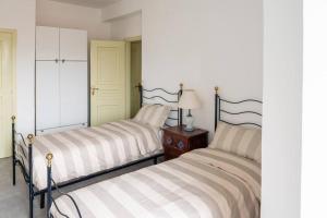 Voodi või voodid majutusasutuse Luxury apartment con vista mare toas
