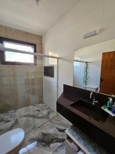 Koupelna v ubytování Casa Flor de Maracujá - ao lado do centro