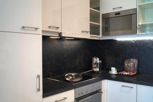 Kuchyň nebo kuchyňský kout v ubytování Relax Residence Südsteiermark