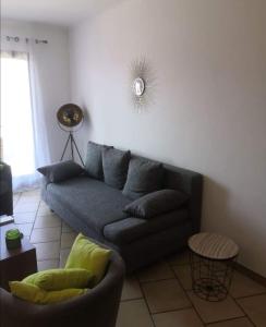 Posezení v ubytování Appartement vue mer Les hameaux de Propriano à Propriano