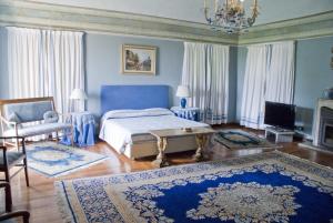 Televízia a/alebo spoločenská miestnosť v ubytovaní Torre dei Frati Bed & Breakfast