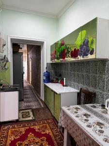 a kitchen with a sink and a counter at 4х комнатная квартира Дом in Samarkand