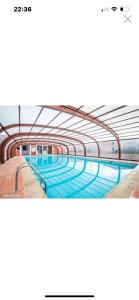 a rendering of a swimming pool in a building at Maison in Béziers