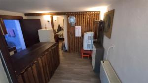 a hallway of a room with a kitchen and a living room at Tavernetta di Francisco in Martina Franca