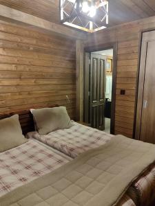 Letto o letti in una camera di Karinna Orman Evleri & Non Alcohol