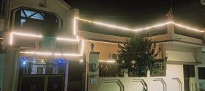a group of lights on the side of a house at DS Home in Lucknow