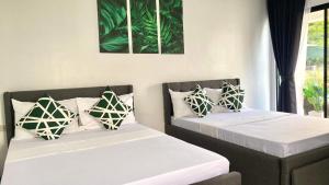 Voodi või voodid majutusasutuse Steffen Resort toas