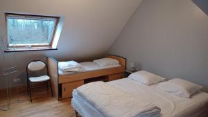 Postel nebo postele na pokoji v ubytování Ma tulipe