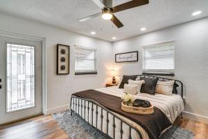 a bedroom with a bed and a ceiling fan at Updated Punta Gorda Home about 1 Mi to Laishley Park! in Punta Gorda