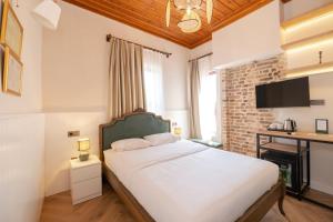 Телевизор и/или развлекательный центр в Saye Konak Hotel ' Kaleiçi&Oldtown'