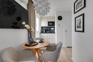 Køkken eller tekøkken på Petit Repit by Grand Apartments + 9 billeder