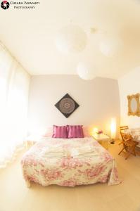 Ένα ή περισσότερα κρεβάτια σε δωμάτιο στο Bed&Breakfast A Bologna +13 φωτογραφίες