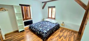 Ένα ή περισσότερα κρεβάτια σε δωμάτιο στο La casa de Mao, proche d'Europa-park, Rulantica