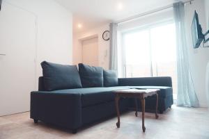 Ruang duduk di Le Baudelaire, T3 en duplex