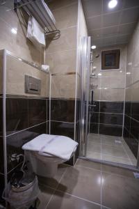 Koupelna v ubytování Payidar Hotel