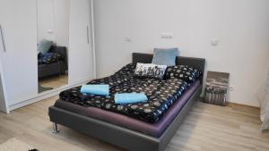 Postel nebo postele na pokoji v ubytování Apartmány - Vinařství Igor Herzán