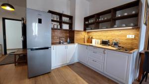Kuchyň nebo kuchyňský kout v ubytování Apartmán Thermalpark Dunajská Streda + 12 fotografií
